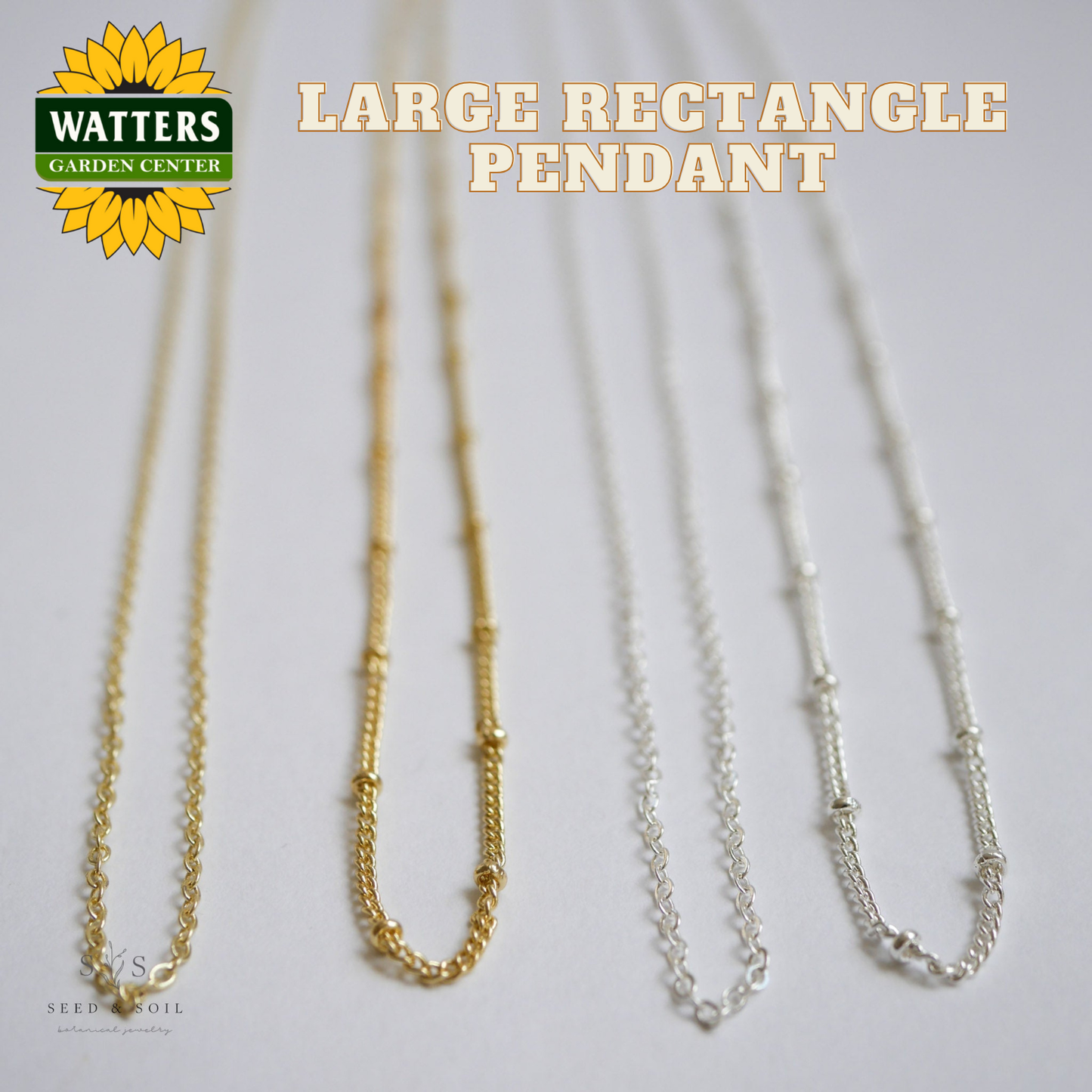 Two necklaces, one gold and one silver, with 'Watters Garden Center' logo on a light background.