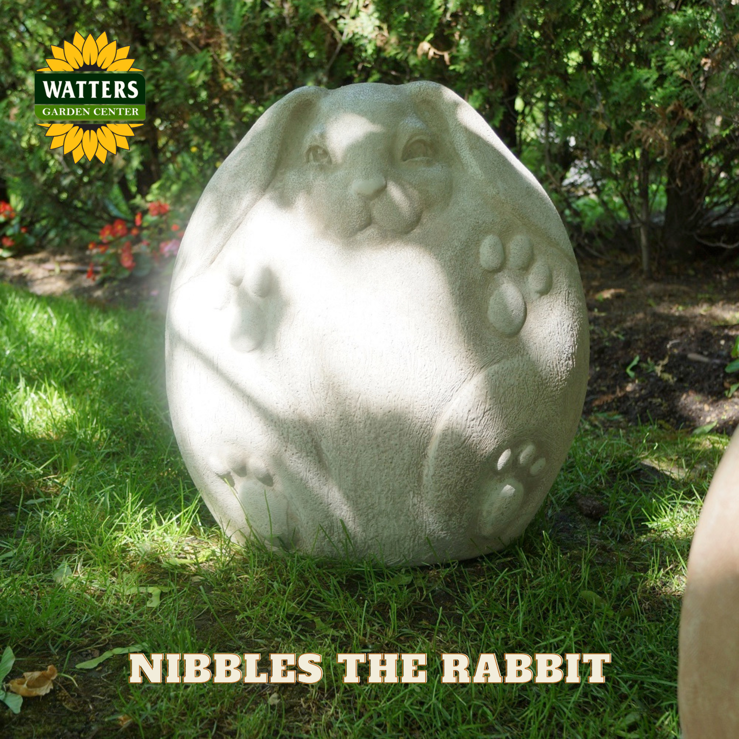 Rabbit statue in a garden.