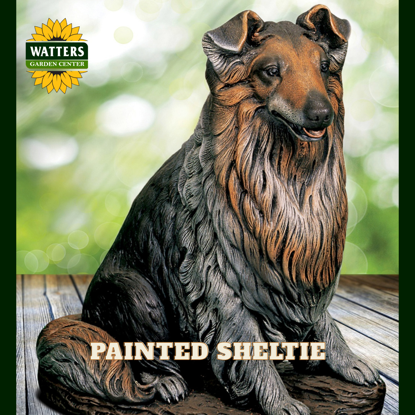 A painted Sheltie dog statue shown sitting on a wooden surface with a blurred green outdoor background. The statue has realistic fur texture in dark gray, black, and warm brown tones.