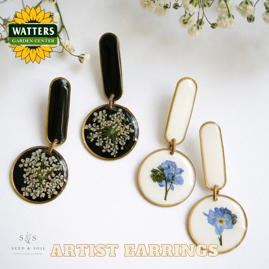 Set of artist earrings with floral designs on a white background, featuring Watters Garden Center logo.