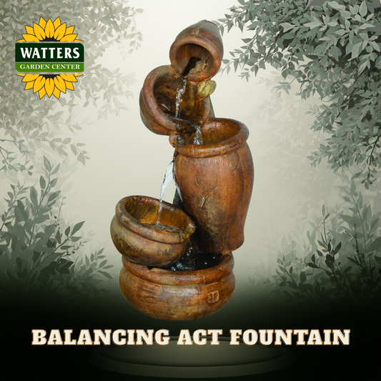 Balancing Act fountain with Watters Garden Center logo and text on a nature-themed background