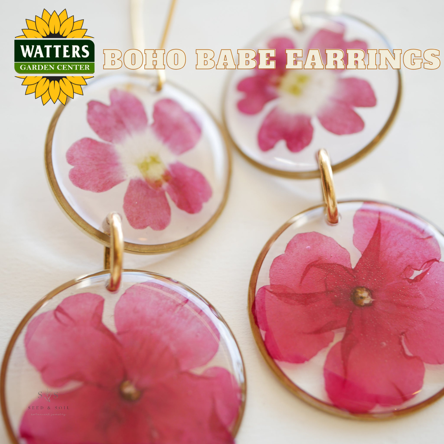 Boho Babe earrings with pink flowers on a white background, featuring Watters Garden Center logo.