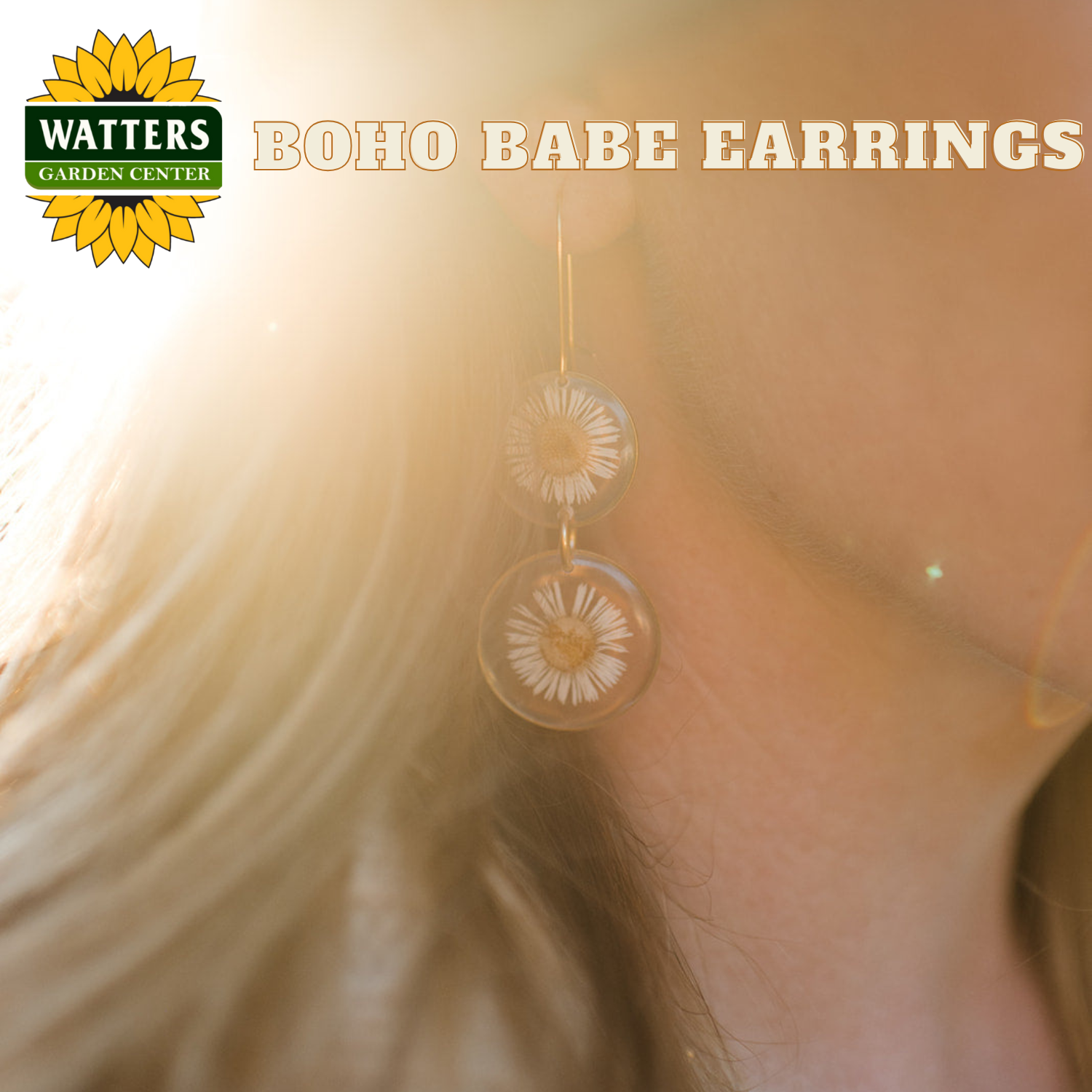 Close-up of a woman wearing 'Boho Babe' earrings with Watters Garden Center logo.