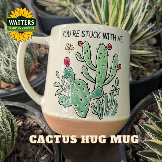 Cactus-themed mug with cacti in the background, featuring Watters Garden Center logo.