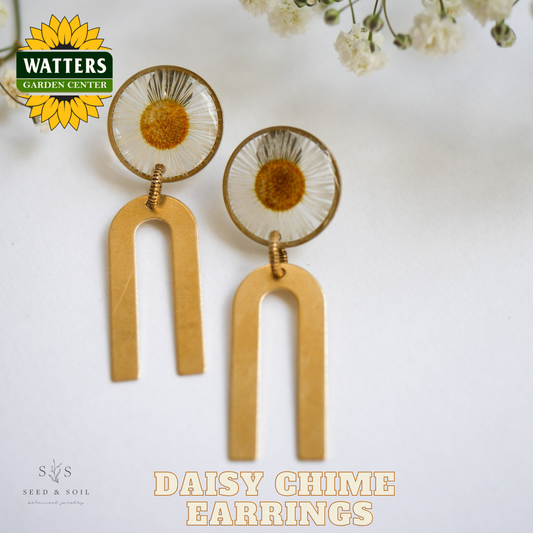 Daisy chime earrings with Watters Garden Center logo on a white background