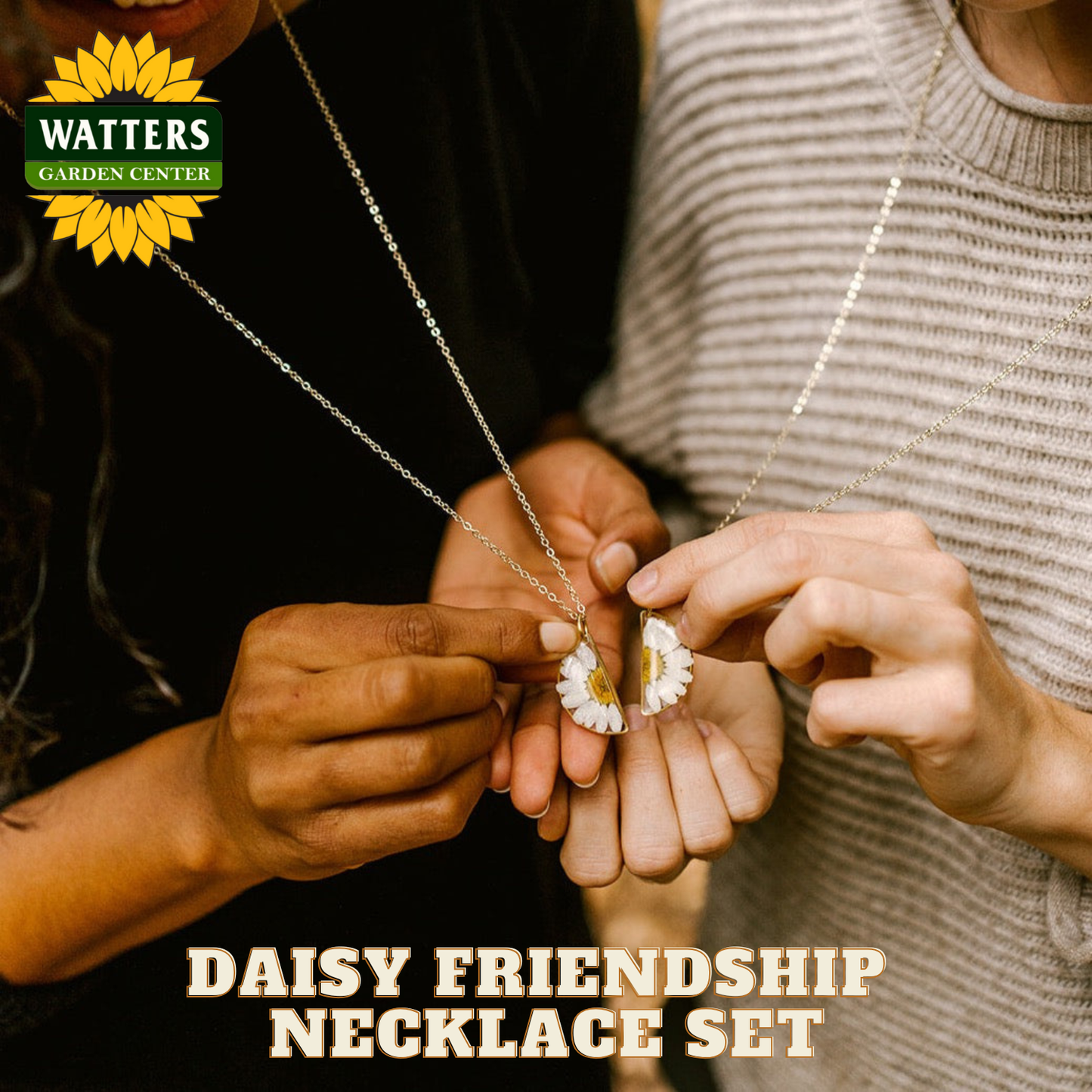 Two people holding a daisy friendship necklace set with Watters Garden Center branding.
