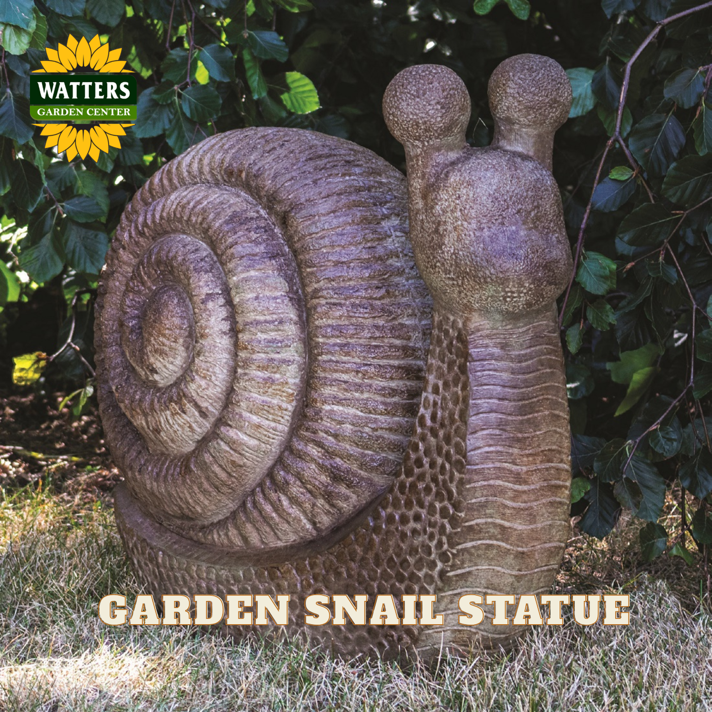 A garden snail statue made to look like stone, shown outdoors in a garden setting with grass and green foliage. The Watters Garden Center logo is in the top-left corner, and the text 'GARDEN SNAIL STATUE' is at the bottom.