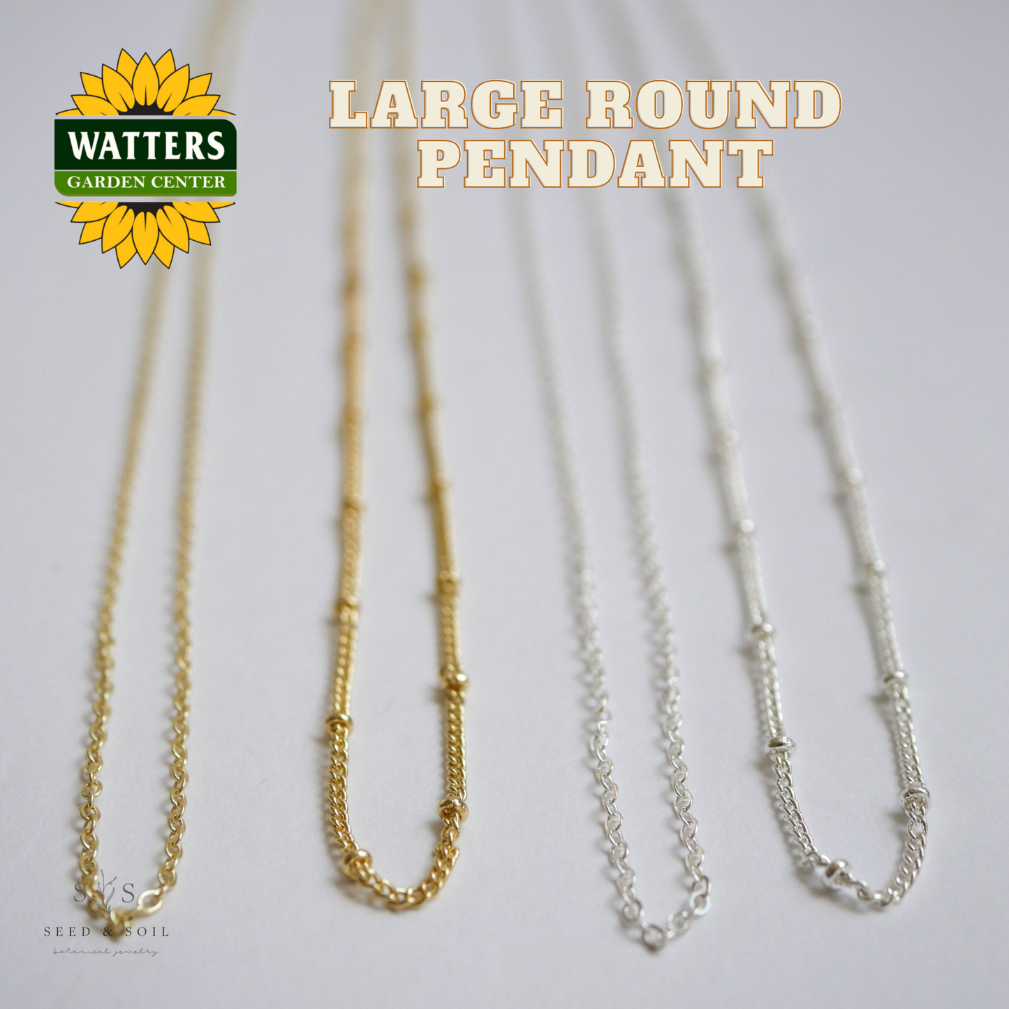 Two necklaces, one gold and one silver, with a 'Watters Garden Center' logo on a light background.