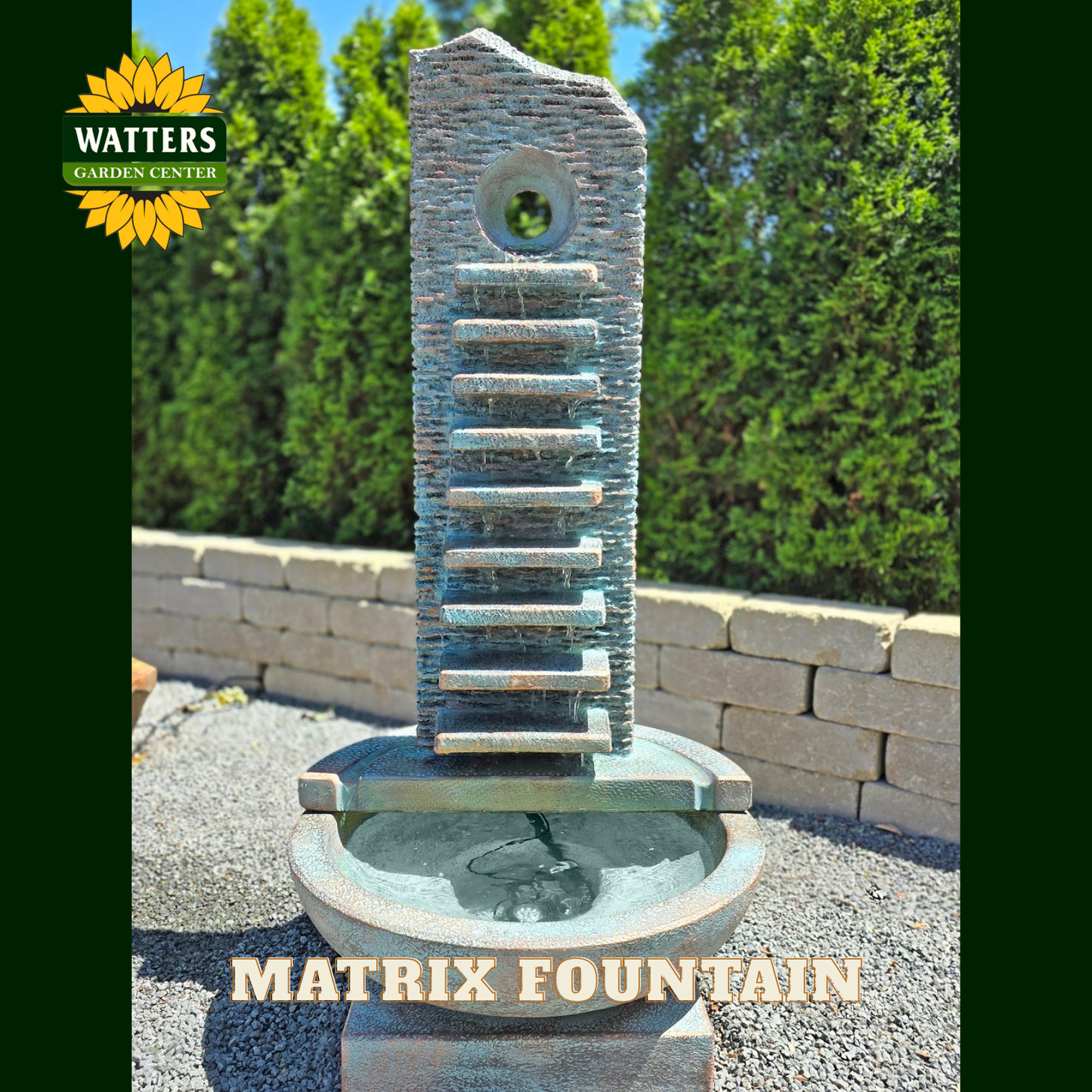 Matrix fountain with Watters Garden Center branding against a green background