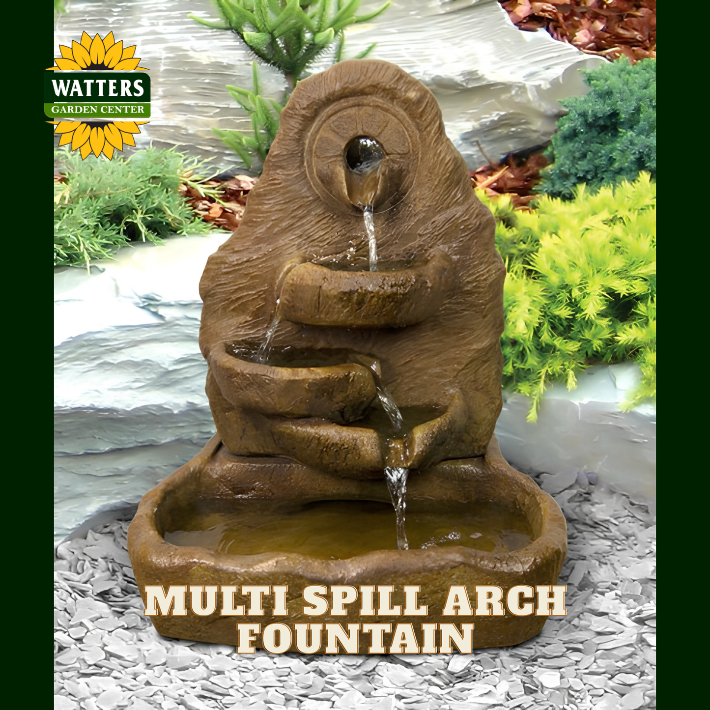 A Watters Gardens Center multi spill arch fountain in a brown stone-like finish, shown with water flowing through tiered bowls into a basin. The product is centered against a landscaped garden backdrop with plants and rocks, and text at the bottom reads 'MULTI SPILL ARCH FOUNTAIN'.