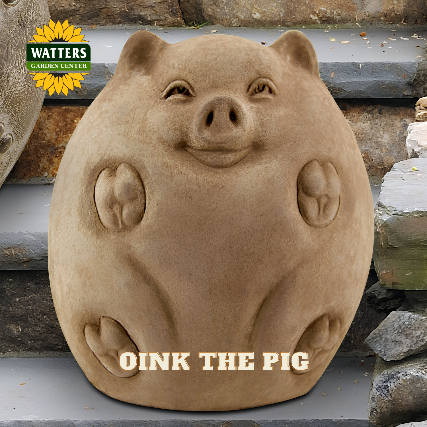 A round, pig-shaped garden statue in a warm tan stone-like finish, shown outdoors on stone steps. The product has carved details for eyes, snout, ears, and paw pads.