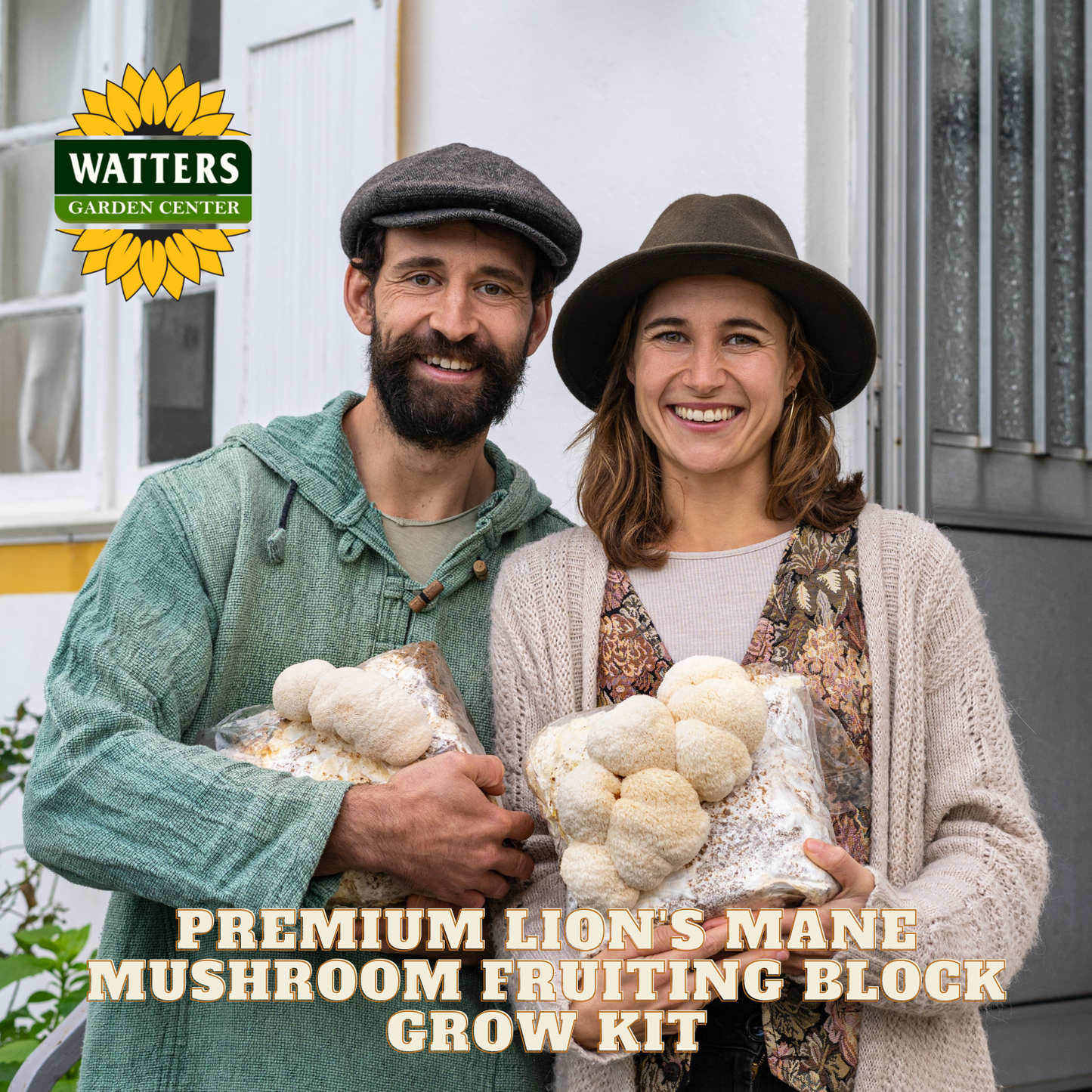 Two people holding lion's mane mushroom fruiting blocks with Watters Garden Center logo.