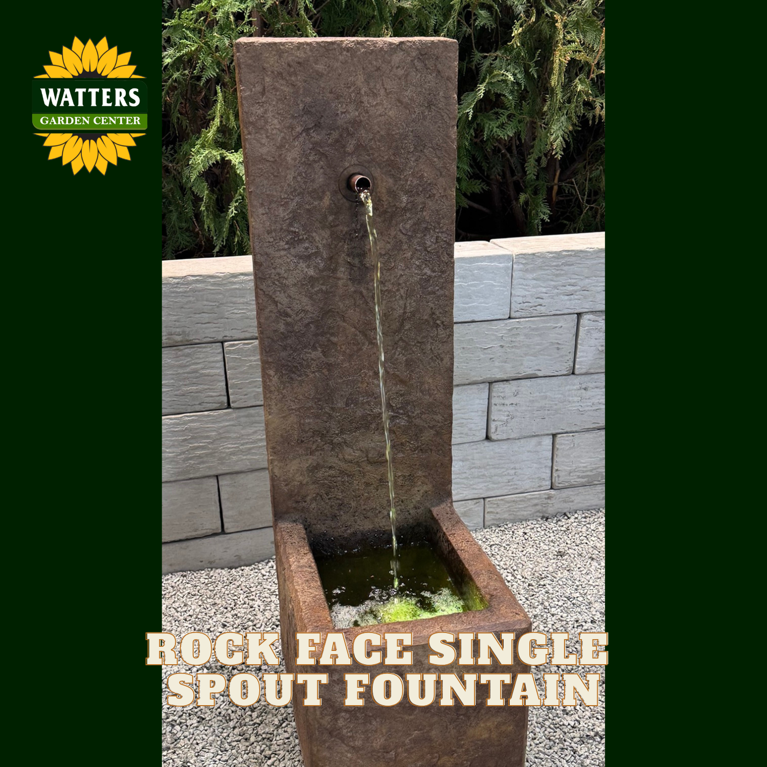 A single rock face spout garden fountain with water flowing down a tall rectangular stone column into a shallow base, shown outdoors against a stone wall and greenery. The image includes a Watters Garden Center logo in the top left and text reading 'ROCK FACE SINGLE SPOUT FOUNTAIN' at the bottom.