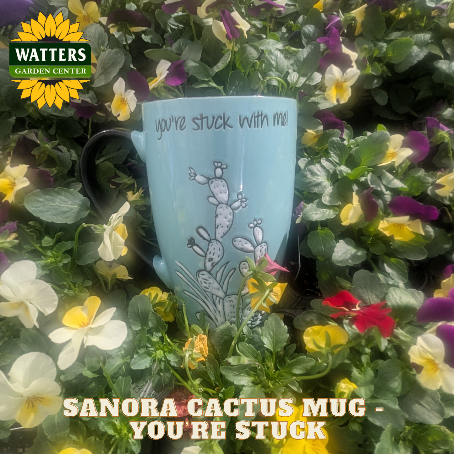 Blue mug with cactus design and text 'you're stuck with me' surrounded by flowers, with Watters Garden Center logo.
