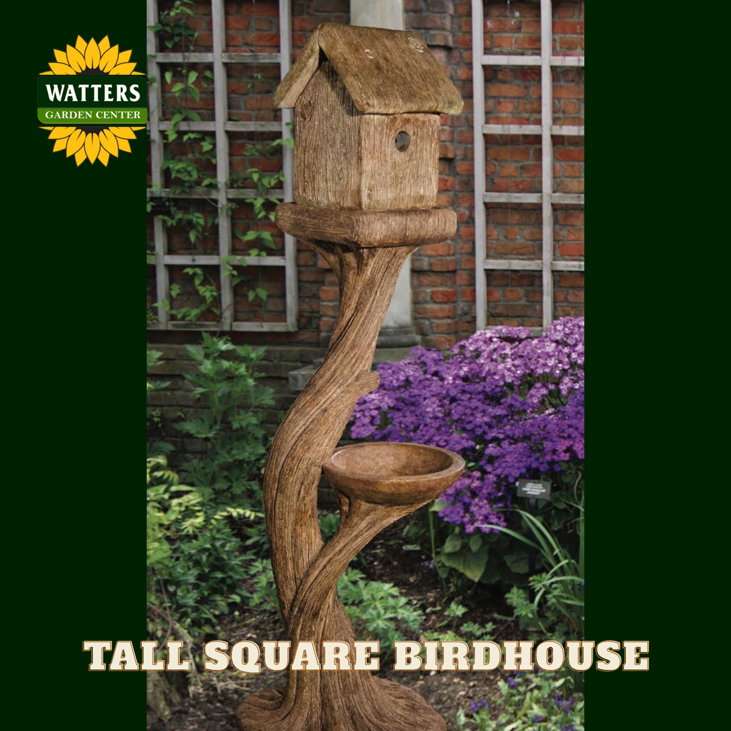 Tall square birdhouse with a natural wood design in a garden setting, featuring Watters Garden Center branding.