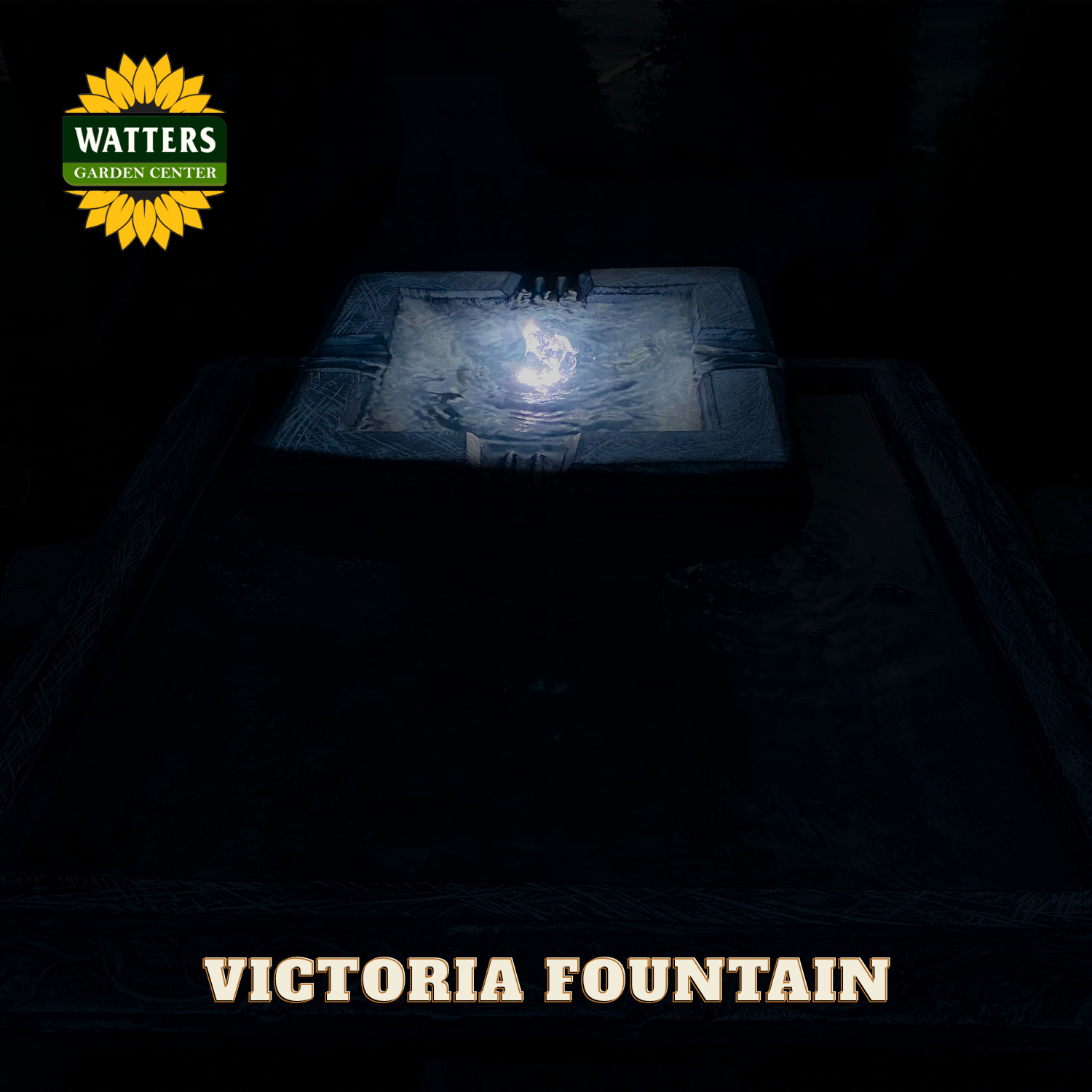 Victoria Fountain with Watters Garden Center logo in the dark