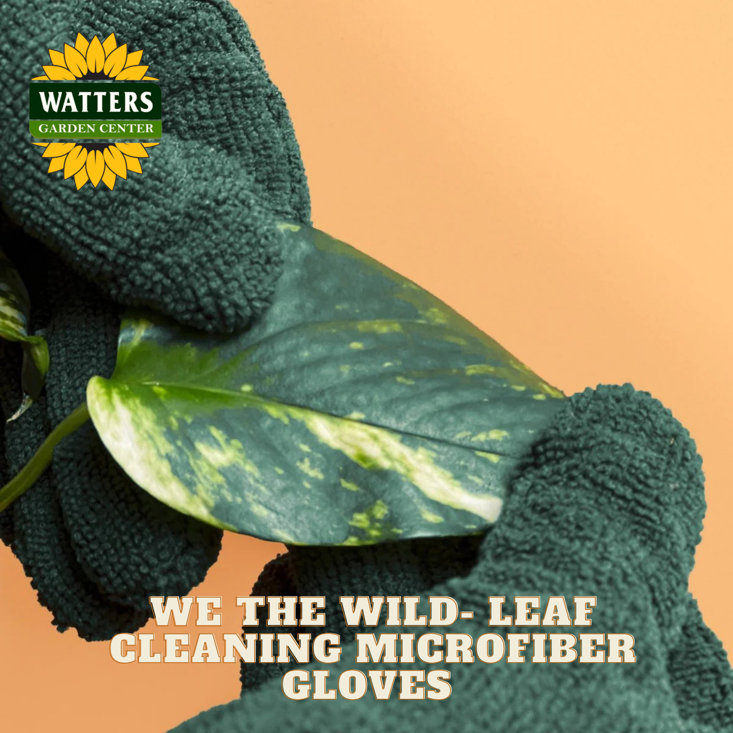 Green cleaning microfiber gloves with a leaf on an orange background, featuring Watters Garden Center logo.
