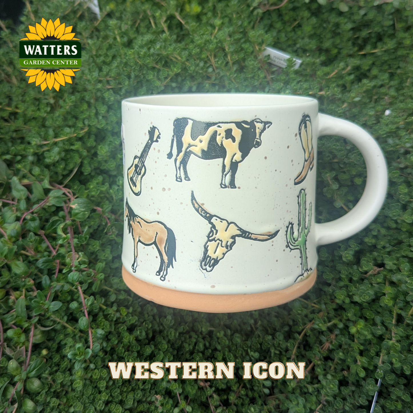 Mug with western-themed design on a green background, featuring Watters Garden Center logo.