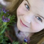 Little-Girl-w-flowers-Gardening-with-Kids-blog