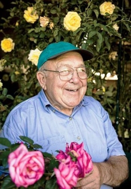 Man with fresh picked roses