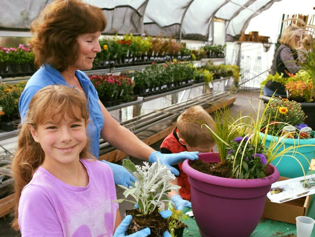 Mom and kids at a container garden class